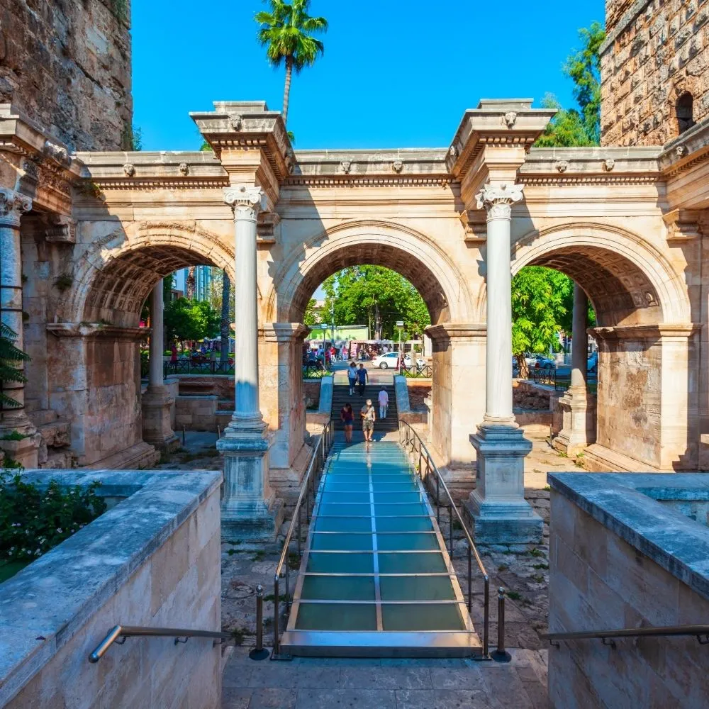 Hadrian's Gate in Antalya, with its three marble arches and the glass walkway over the Roman road