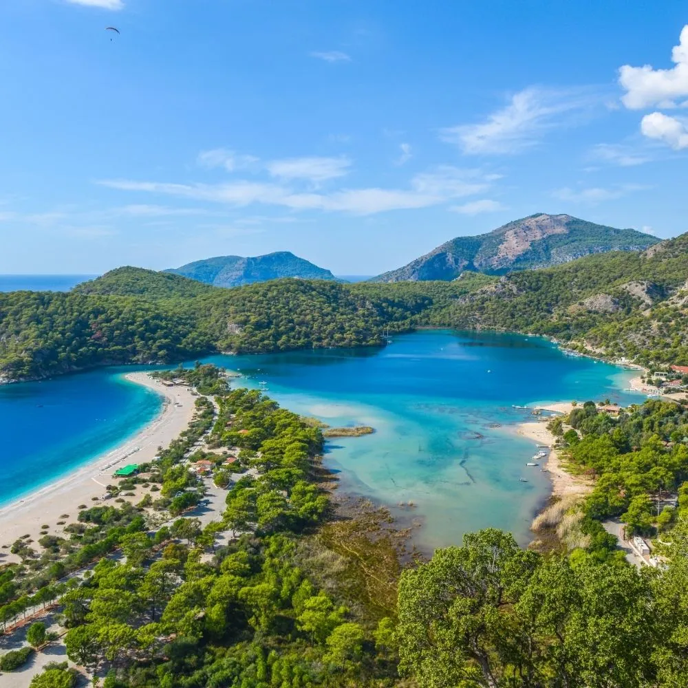 The Ölüdeniz lagoon and its sand spit seen from the air, with Fethiye in the background