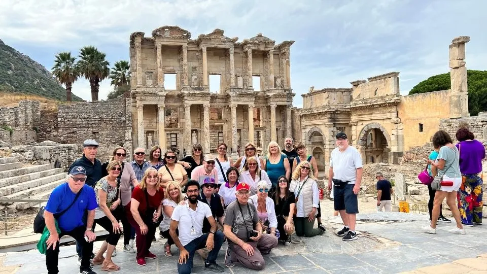 Group with their licensed guide in front of the Library of Celsus at Ephesus